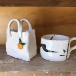 student work bag and cup at Rui Ceramics